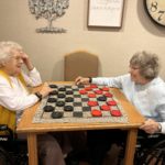 residents playing checkers